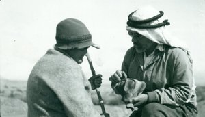 John Garstang showing a piece of Yahudieh Ware pottery chalice to Mrs Garstang by English Photographer